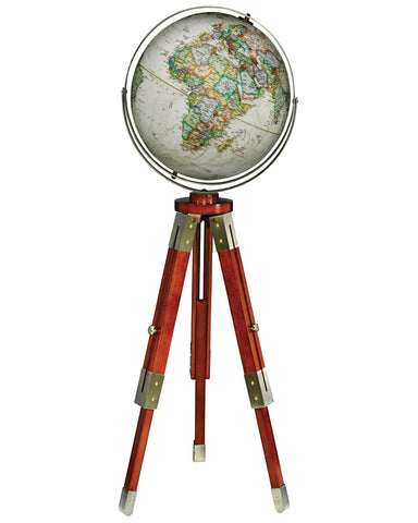 A floor standing globe with a walnut-finished hardwood tripod stand, featuring antique brass plated hardware and a hand-applied map in earth-tones.