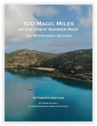 Cover of the book '100 Magic Miles of the Great Barrier Reef: The Whitsunday Islands' showing a scenic view of the Whitsunday Islands with boats in the distance.